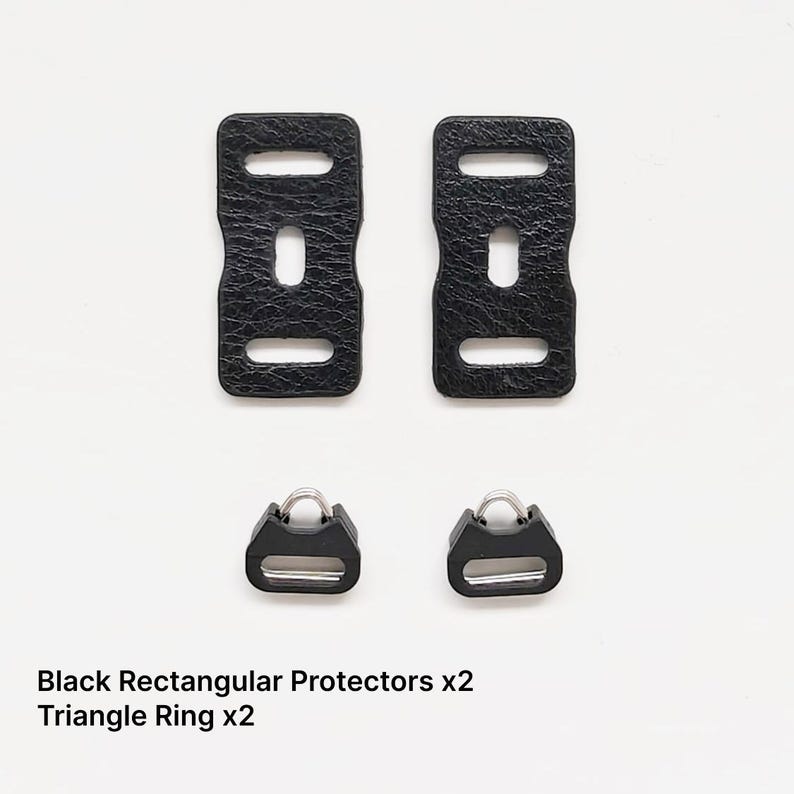 May include: Two black rectangular protectors and two triangle rings are displayed against a white background. The protectors have a textured surface and three rectangular cutouts. The triangle rings have a D-shaped ring attached to a rectangular base.