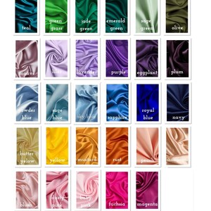 May include: Silk satin color chart featuring swatches in various colors, including white, black, and shades of blue, green, and pink. The chart includes the text "SILK SATIN COLOUR CHART".