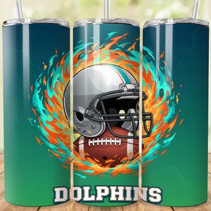 May include: A set of three stainless steel tumblers with a teal to green gradient. Each tumbler features a football helmet and football design surrounded by flames. The word "DOLPHINS" is printed in white at the bottom.