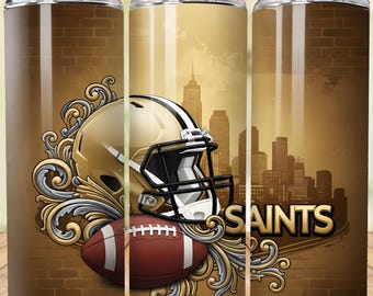 May include: A set of three stainless steel tumblers with a football theme. Each tumbler features a gold football helmet, a brown football, and the word "SAINTS" against a cityscape background. The tumblers have a brown brick-like pattern.