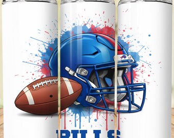 May include: White tumbler featuring a blue football helmet and a brown football with white stripes. The design includes red and blue paint splatters and the word "BILLS" in blue. The tumbler has a silver lid and a straw.
