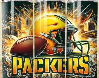May include: A green and yellow Packers-themed tumbler with a football, helmet, and city skyline design. The word "PACKERS" is prominently displayed in yellow and green. The tumbler has a straw and is set against a blurred background.