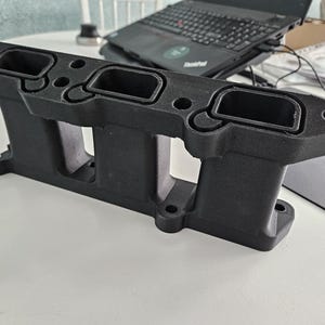 M54 intake manifold transition to N54 intake manifold.