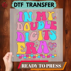 May include: A set of three ceramic mugs with a speckled, matte finish. The mugs are in shades of cream, light gray, and dark gray. Each mug has a simple, minimalist design and a rounded handle.