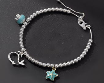 Braccialetto con ciondolo a tema oceano / Gioielli con ciondolo a stella marina / Braccialetto estivo da spiaggia / Regalo di gioielli costieri carino per lei