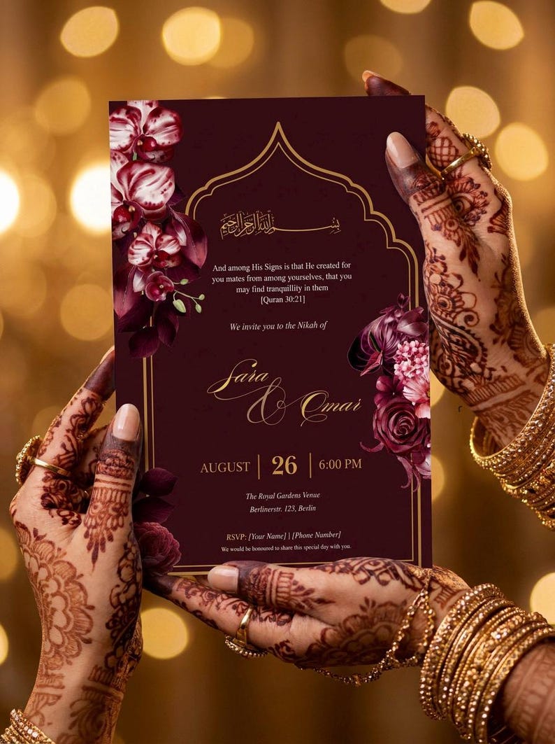 May include: Burgundy wedding invitation with floral accents, held by hands adorned with henna and gold jewelry. The invitation includes the names "Sara & Omar", date, time, and venue details.