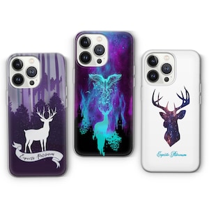 May include: Three phone cases with fantasy-themed designs. One case features a white deer silhouette against a purple forest background with the text "Expecto Patronum". Another has a phoenix and deer against a purple and blue galaxy. The third case has a deer silhouette with a galaxy design and the text "Expecto Patronum".