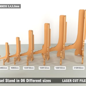 May include: A collection of six wooden easel stands of varying sizes, displayed in a row. Each stand is a light brown color and has a unique design. The sizes range from 60x53mm to 210x185mm. Text on the image reads "Easel Stand in 06 Different sizes" and "LASER CUT FILES."