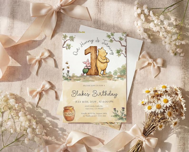 Watercolor illustration of a classic Winnie the Pooh and Piglet standing by a large wooden number one, featuring a honey pot, bees, and thistles on a soft yellow wash background.