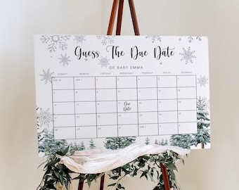 May include: A white sign with the text "Guess The Due Date of Baby Emma" and a calendar grid. The calendar is decorated with snowflakes and evergreen trees. The words "Due Date" are written on the 17th square.
