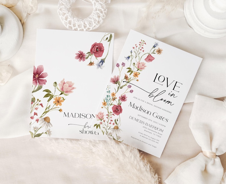 Editable bridal shower invitation template with romantic wildflower watercolor design, featuring soft pink, yellow, blue, and burgundy florals on a white background, paired with elegant serif and modern script fonts