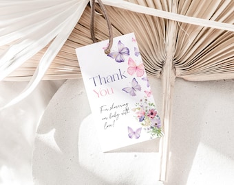 May include: A white thank you tag with purple and pink butterflies and flowers. The text on the tag reads "Thank You" and "For sharing our baby with love!"