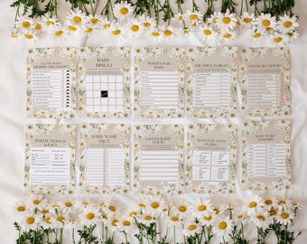 May include: A collection of ten baby shower game cards with daisy floral borders. The cards feature various game titles such as "Baby Bingo", "Wishes for Baby", and "Guess Baby Food". White daisies are arranged around the cards.