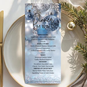 May include: A festive dinner menu with a blue and silver glitter background, featuring Christmas ornaments. The menu lists appetizers, main courses, sides, dessert, and drinks. Gold silverware and a plate are in the foreground.