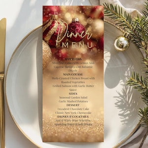 May include: A festive Christmas dinner menu with gold and red ornaments. The menu includes appetizers, main courses, sides, dessert, and drinks. The menu is on a white plate with gold silverware and a sprig of evergreen.