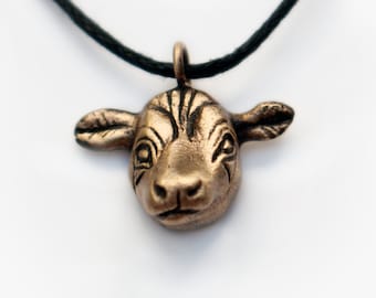 Tiny cow head pendant necklace