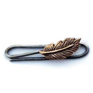 Feather tie bar