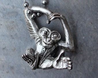 Monkey necklace, ape gibbon orangutang