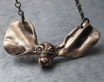 Basset hound bronze bib necklace