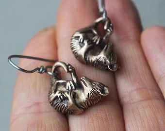 Baby opossum titanium earrings