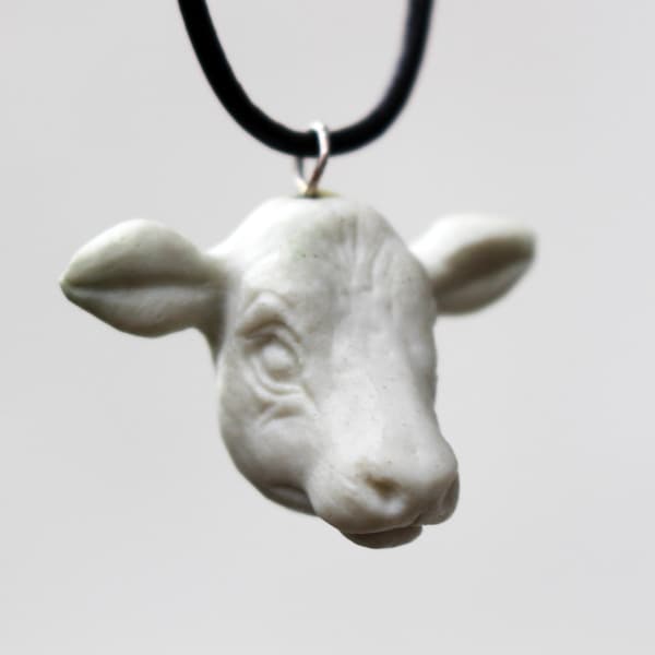 Cow head porcelain pendant