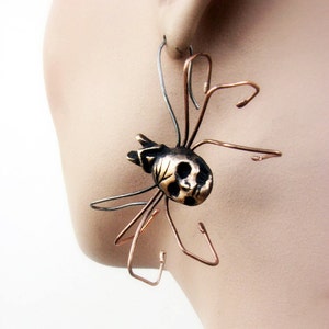 Skull spider earring bronze and titanium wire sculpture