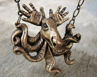 Octomoose pendant bronze sculpture