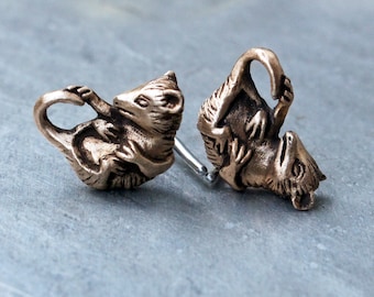 Opossum cuff links