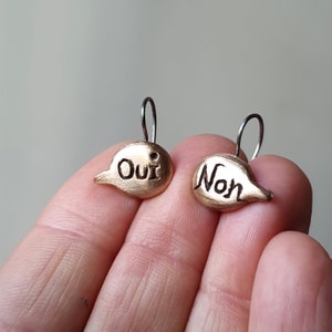 Speech bubble earrings non oui cartoon bronze and titanium earrings