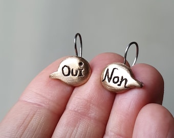 Speech bubble earrings non oui cartoon bronze and titanium earrings