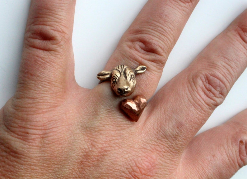 Cow love ring bronze head