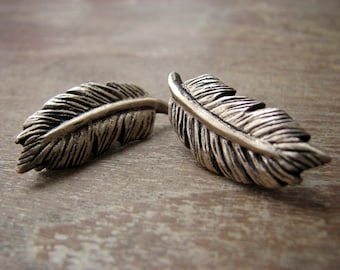 Feather cufflinks