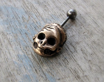 Piercing ombelico teschio Barbie acciaio 316L e bronzo