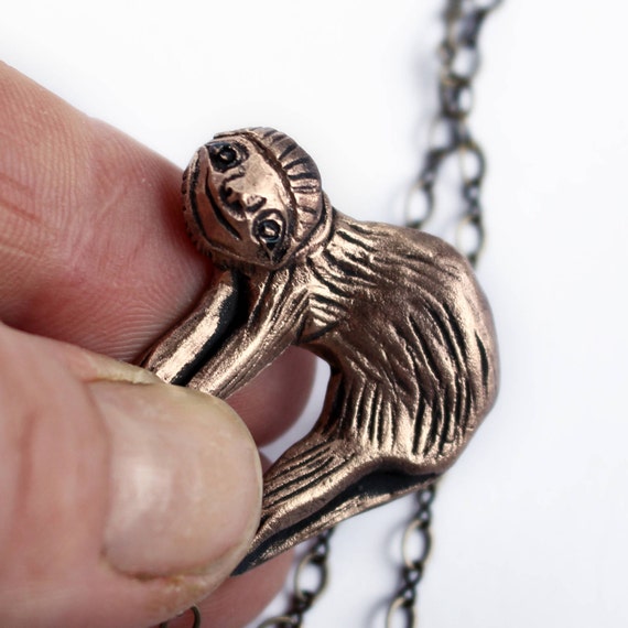 Happy little sloth necklace