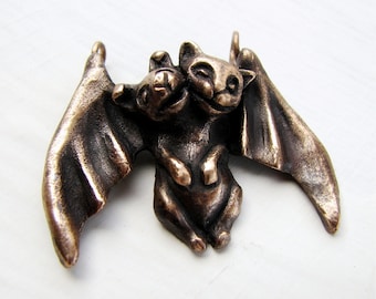 Conjoined twin cat & dog bronze pendant