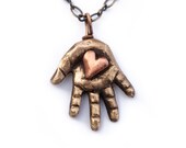 Heart in hand initial necklace