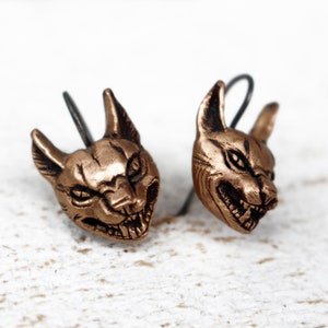 Wild cat bronze and titanium dangle earrings lynx caracal