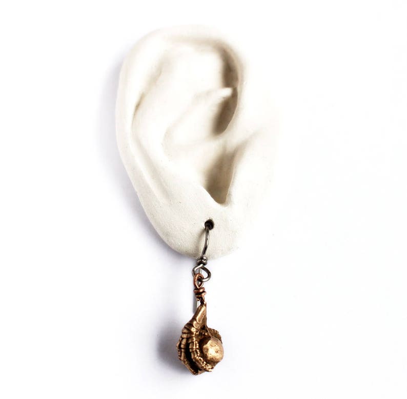 Human ear earring display photo prop image 3
