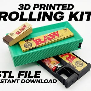 May include: A 3D-printed rolling kit in green and black, with the text "3D PRINTED ROLLING KIT" and "STL FILE INSTANT DOWNLOAD". The kit includes a green tray, a black storage compartment, and packs of rolling papers.