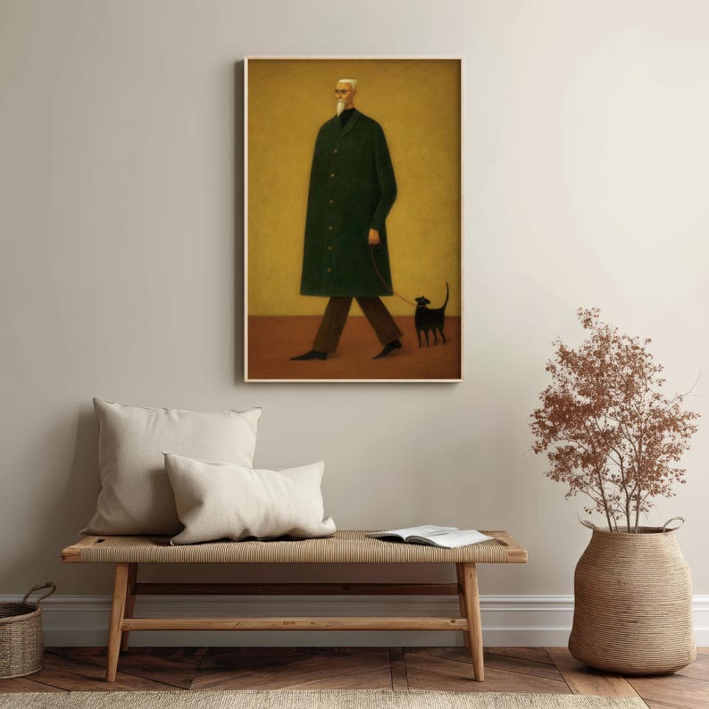 May include: A framed art print depicts a figure in a long green coat walking a black dog on a leash. The artwork has a minimalist style with a muted color palette of green, brown, and yellow.