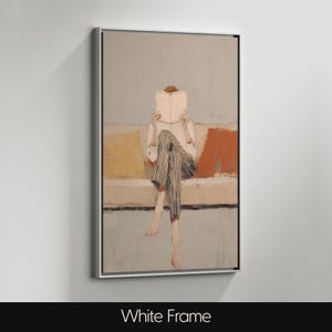May include: Abstract artwork in a white frame. The painting shows a person reading a book while seated on a sofa. The person is wearing a white shirt and striped trousers. The sofa has yellow and orange cushions. The background is a light blue.