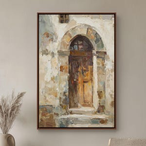 May include: Oil painting of a weathered doorway with a brown wooden door set in a stone archway. The artwork features a palette of beige, brown, and gray tones, with visible brushstrokes. The painting is framed in a dark brown wooden frame.
