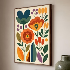 May include: A framed art print with a floral design in orange, blue, green, and purple. The artwork has a cream background and a dark brown wooden frame. The style is reminiscent of mid-century modern art, with a bold, graphic aesthetic.