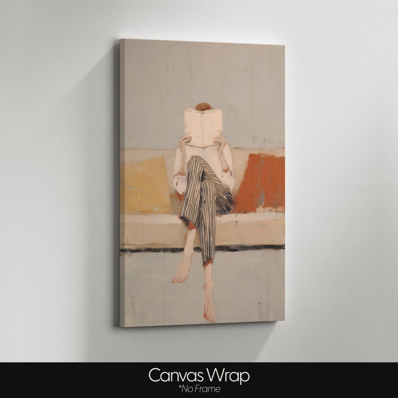 May include: Canvas print of a person reading a book on a sofa. The person wears a white shirt and striped trousers. The background has muted yellow, orange, and blue tones. The artwork is unframed.