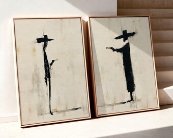 May include: Two framed rectangular wall art pieces featuring abstract black ink figures on a textured beige background. Each painting depicts a solitary silhouette wearing a wide-brimmed hat and holding a small object, rendered in bold, expressive brushstrokes.
