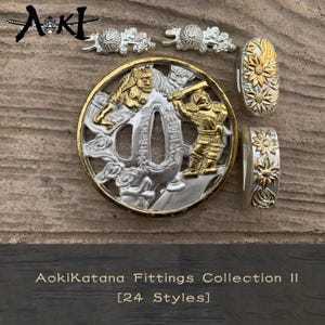 May include: AokiKatana Fittings Collection II. The image displays various silver and gold-toned metal fittings, including a round tsuba with warrior figures, floral accents, and decorative elements. The text reads "AokiKatana Fittings Collection II [24 Styles]"