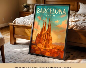 May include: Framed vertical poster featuring the Barcelona skyline with the text "Barcelona Spain". The artwork depicts the Sagrada Familia basilica in warm tones against a blue sky with clouds. The poster is in a black frame.