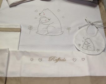 Pram/cot set with name and teddy bears. Bib, sheet, and removable padded blanket.