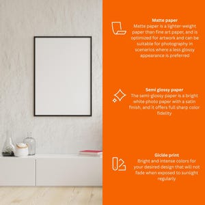 a white frame hanging on a wall, with a few decorative items placed on a white shelf below it.