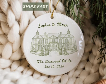 May include: A round white ceramic ornament featuring a green line-art illustration of a large estate. The text reads Sophia & Oliver, The Rosewood Estate, and Dec 06, 2026. A gold string is attached to the top for hanging the decorative piece.